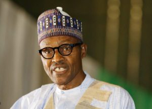 Nigerian former Gen. Muhammadu Buhari speaks moments after he was presented with a certificate to show he won the election in Abuja, Nigeria, Wednesday, April 1, 2015. Nigerian President Goodluck Jonathan conceded defeat to Buhari, a 72-year-old former military dictator, who was elected in a historic transfer of power following the nation's most hotly contested election ever. (AP Photo/Sunday Alamba)